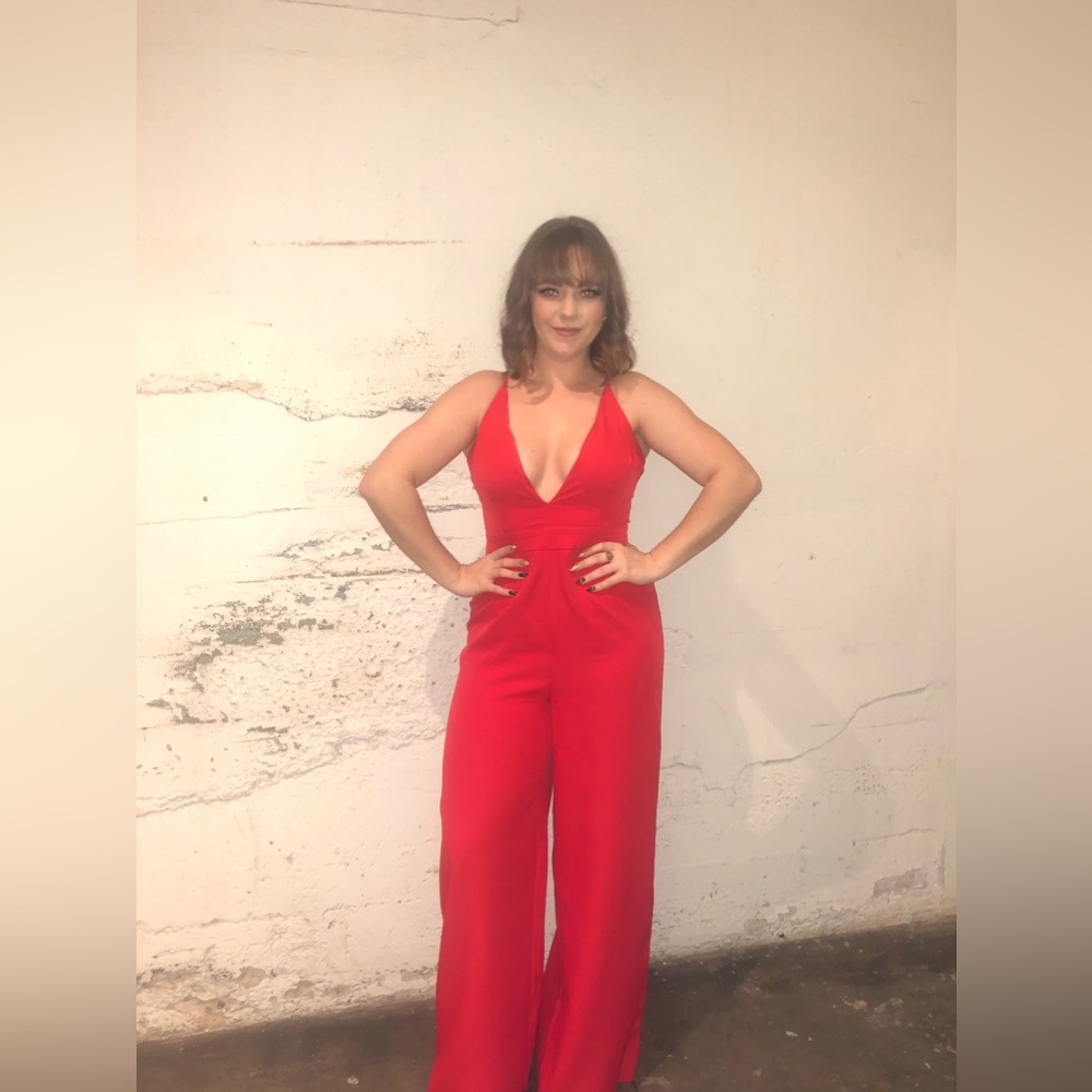 Deep red jumpsuit with plunging v